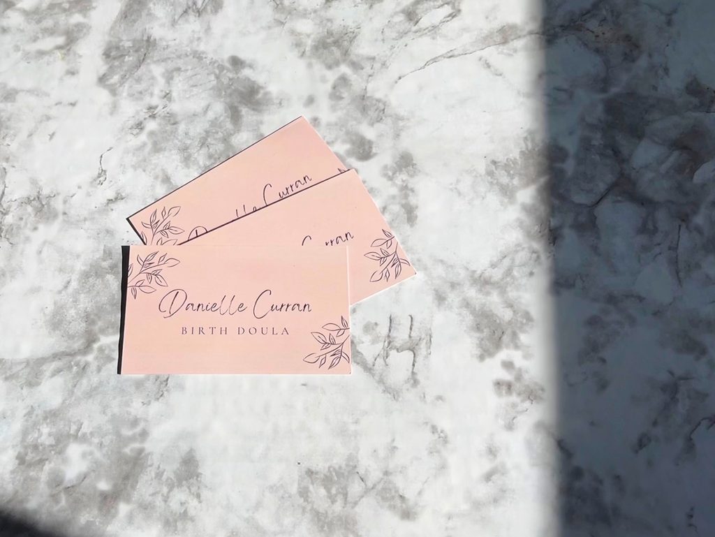 birth doula cards laying on a marble background
